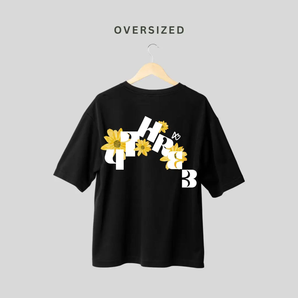 4three oversized black t-shirt back view with sunflower graphic